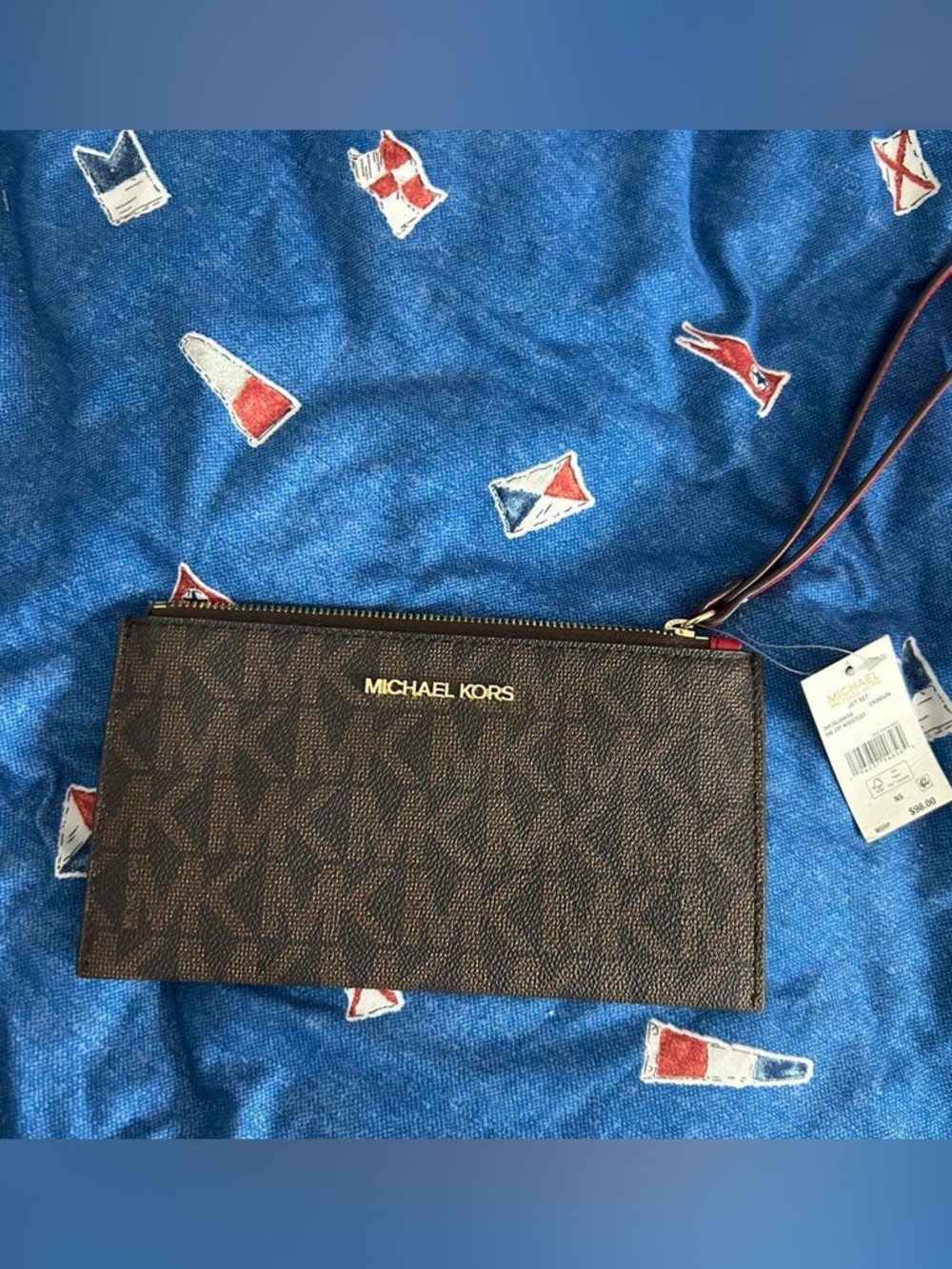 Michael Kors Brown Exterior Tan Interior Zip Pouch with Red Logo Tab